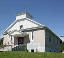 église